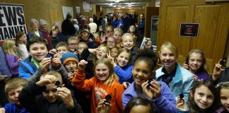 Saratoga Quarter Launch Ceremony Highlights Children holding free Saratoga quarter