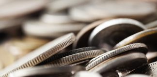 U.S. Mint Produces Over 7.3 Billion Coins in First Half of 2021 Pile of US coins