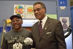 Kenneth Holland stands - Congressman Emanuel Cleaver II
