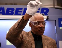 Dr. J after striking coin