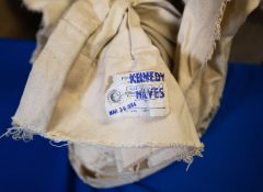 Label stables to bag of Early Issue 1964-D Kennedy Half Dollars