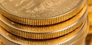 Gold Rises 0.6%; Silver Gains For Third Day Stack of bullion American Gold Eagles-jan-13-21