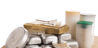 Gold Ends Week at Three-Week High silver coins, gold bars, silver bars March 19,2021.fw