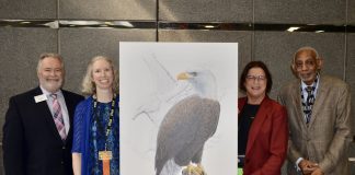 Emily Damstra Signs and Donates Artwork Ellsworth, Damstra, Kiick and Ross