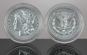 CoinNews photo of two 2021 Morgan Silver Dollars with the 'CC' privy mark