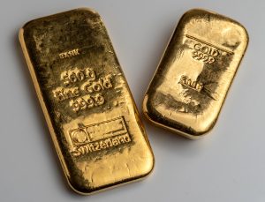 Gold was poised for a weekly gain until falling on Friday