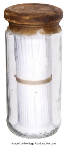 Small Glass Jar holding 20000-word Forrest Fenn Autobiography