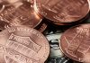 U.S. Mint Produces 670.42 Million Coins for Circulation in March; 1.88 Billion in First Quarter Lincoln cents stacked on money