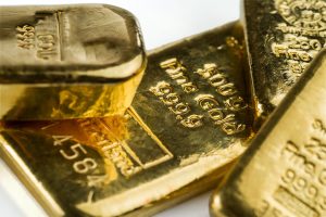 Gold logged a modest 0.3% weekly loss