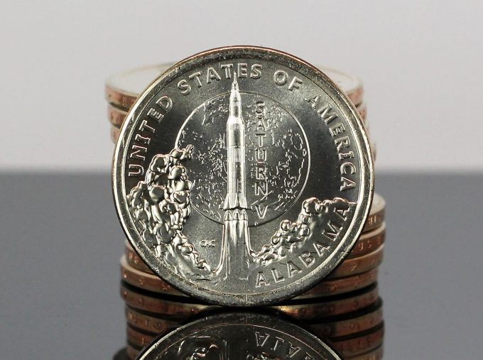 CoinNews photo stack of American Innovation Dollars for Alabama