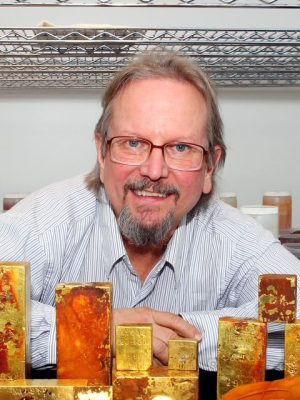 Scientist Bob Evans with shipwreck treasure